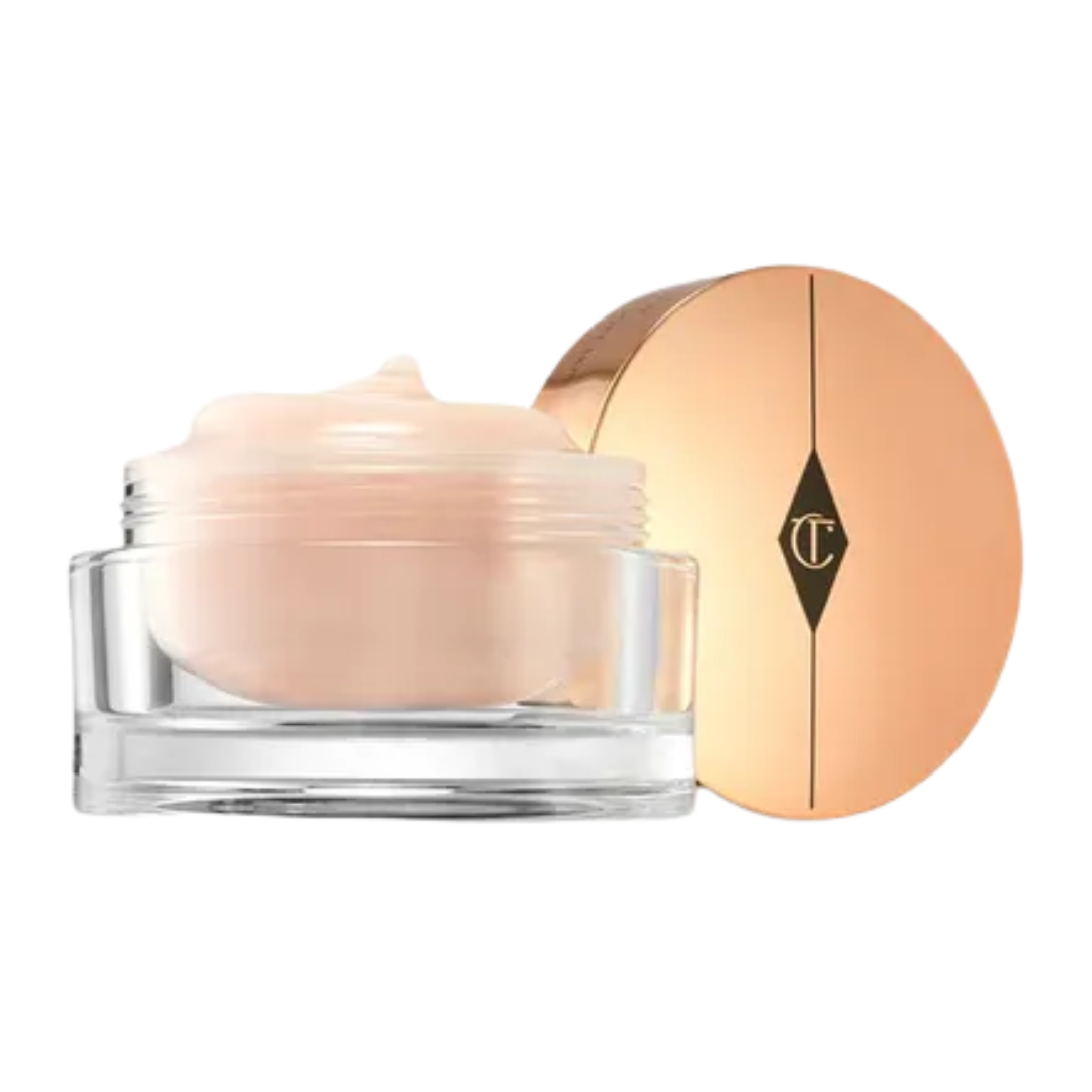 Cosmetic cream jar with a gold lid on a white background