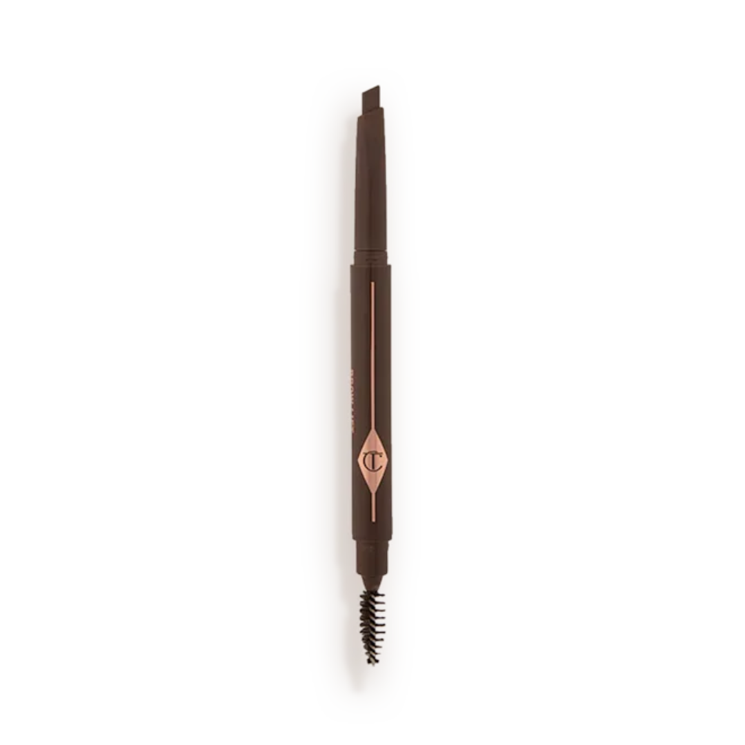 Eyebrow pencil with a rose gold cap on a white background