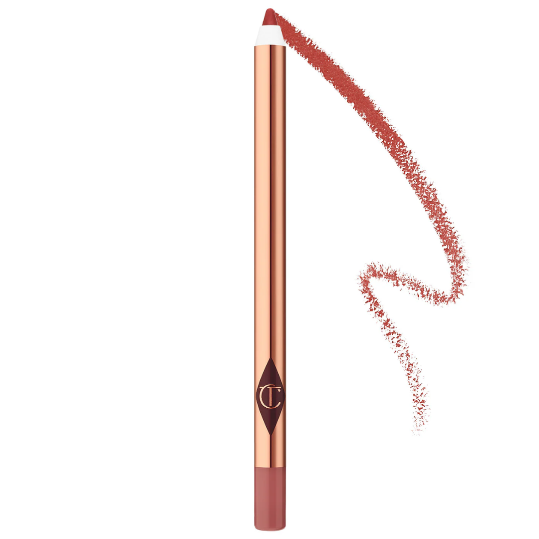 Lip liner pencil with a swatch of color on a white background