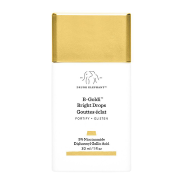 Drunk Elephant B-Goldi Bright Drops packaging with gold cap and white label.