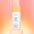 C-Luma Hydrabright Serum bottle on a gradient background