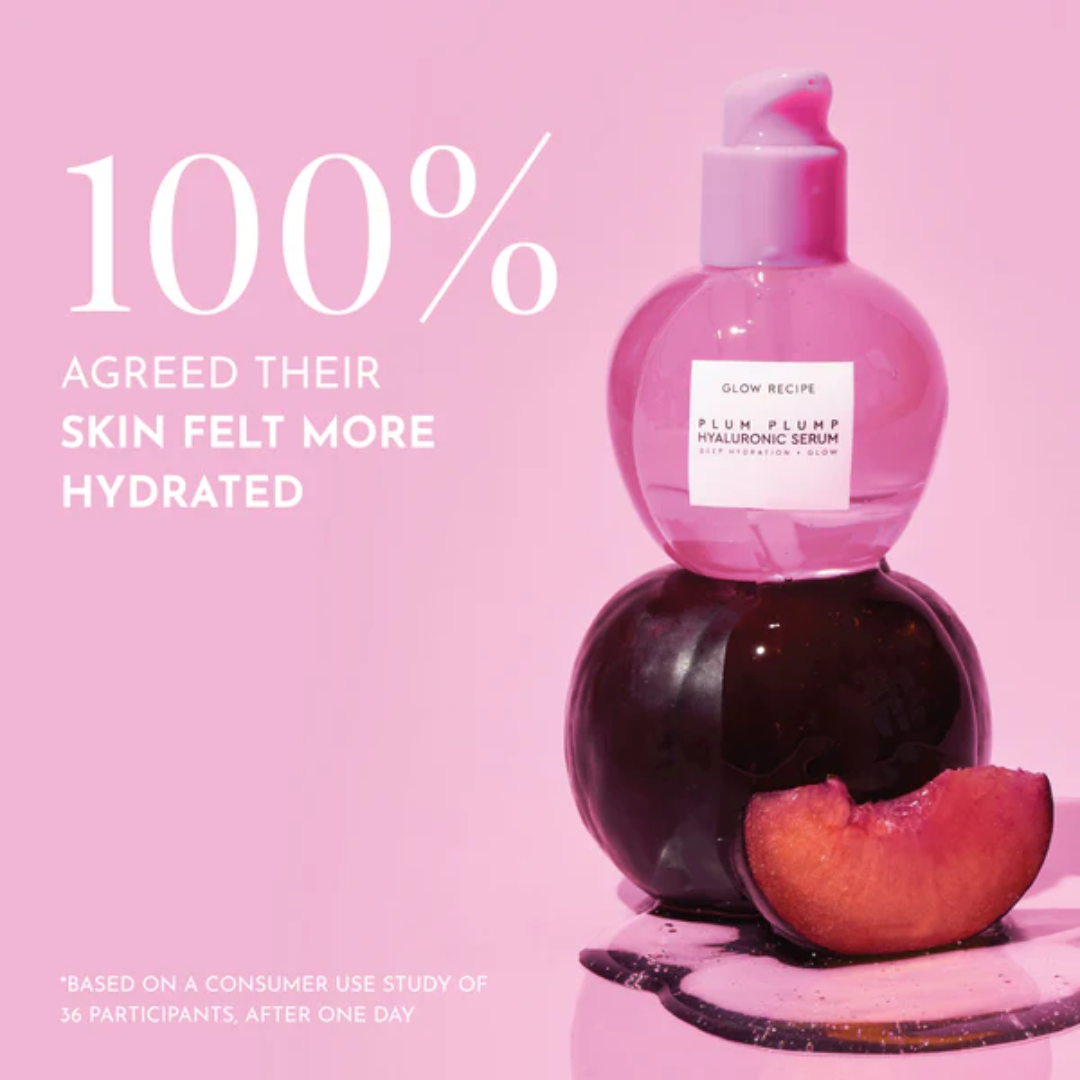 Pink serum bottle with a white label on a white background