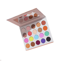 Makeup palette with a variety of colors on a white background
